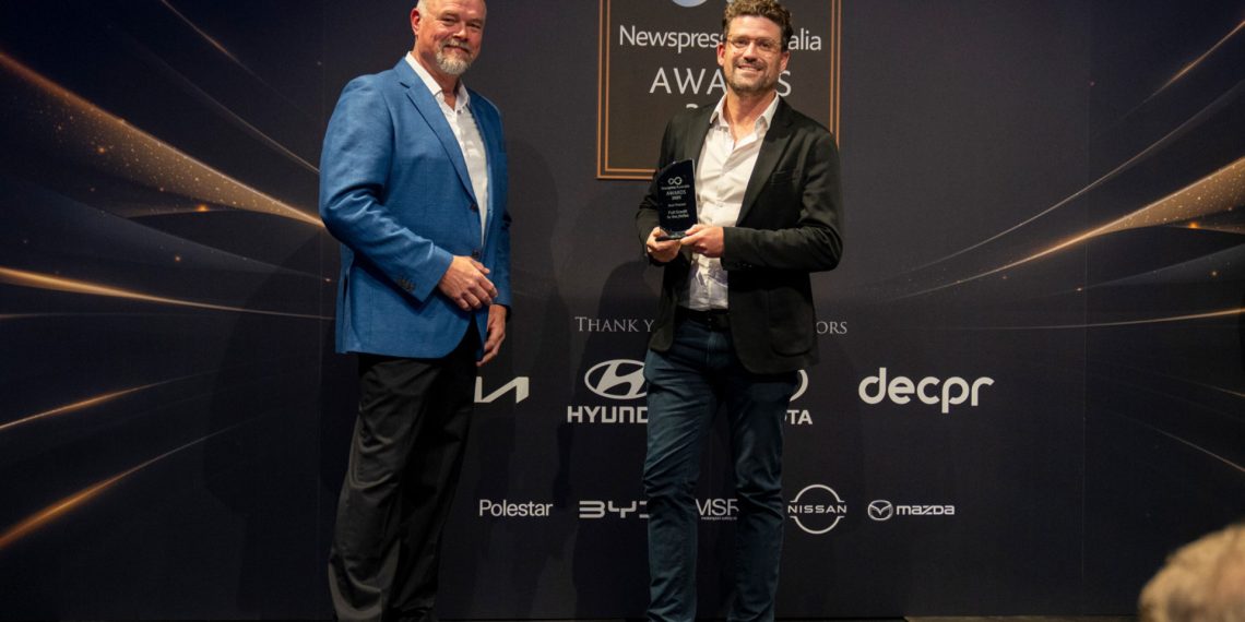 Andrew van Leeuwen (right) accepting the Best Podcast award in Sydney. Image: Newspress Australia
