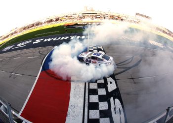 Joey Logano celebrates victory
